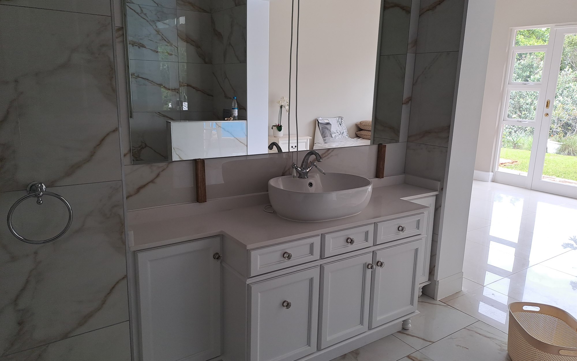 View this project in the gallery Custom white bathroom vanity by 2G Custom Furniture